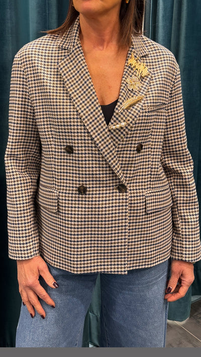 TENSIONE IN GIACCA CHECK