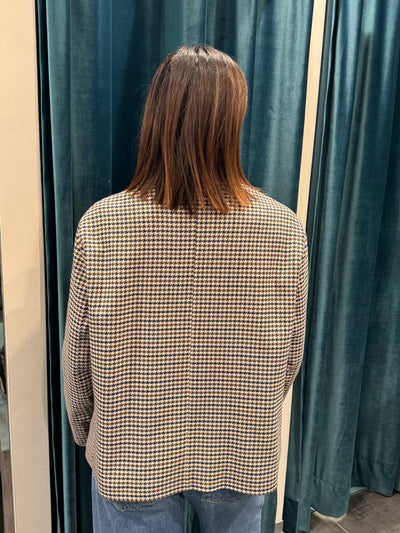 TENSIONE IN GIACCA CHECK